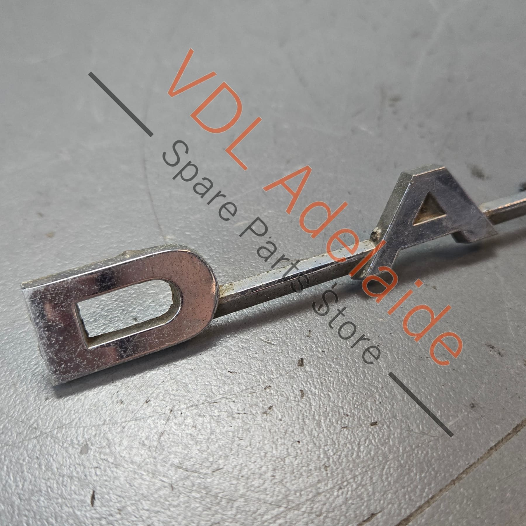 Datsun 1600 510 Rear Panel Boot Badge Emblem Genuine Cast Chrome #03 **damaged stock** - Image 3